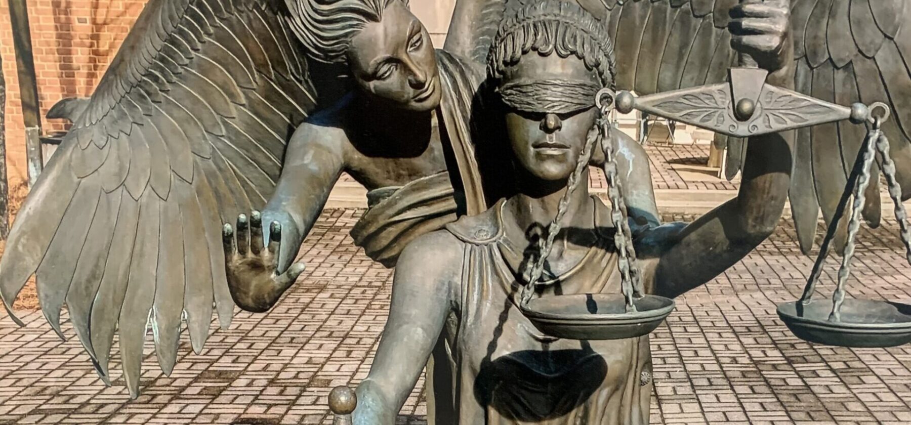 Justice and Mercy statue by Glynn Acree