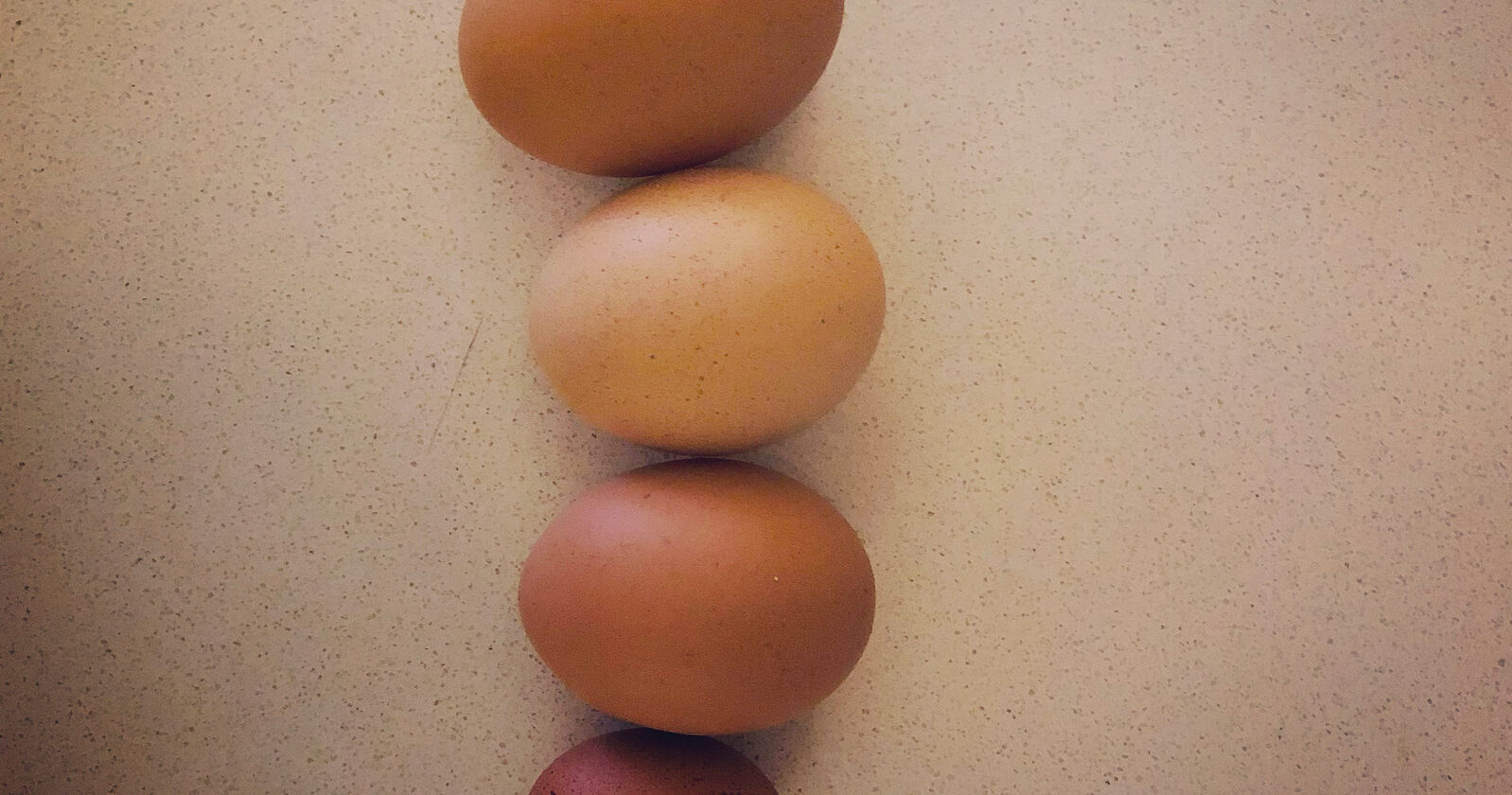 image of stacked eggs of different sizes
