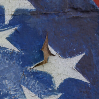 Torn and tattered paper flag