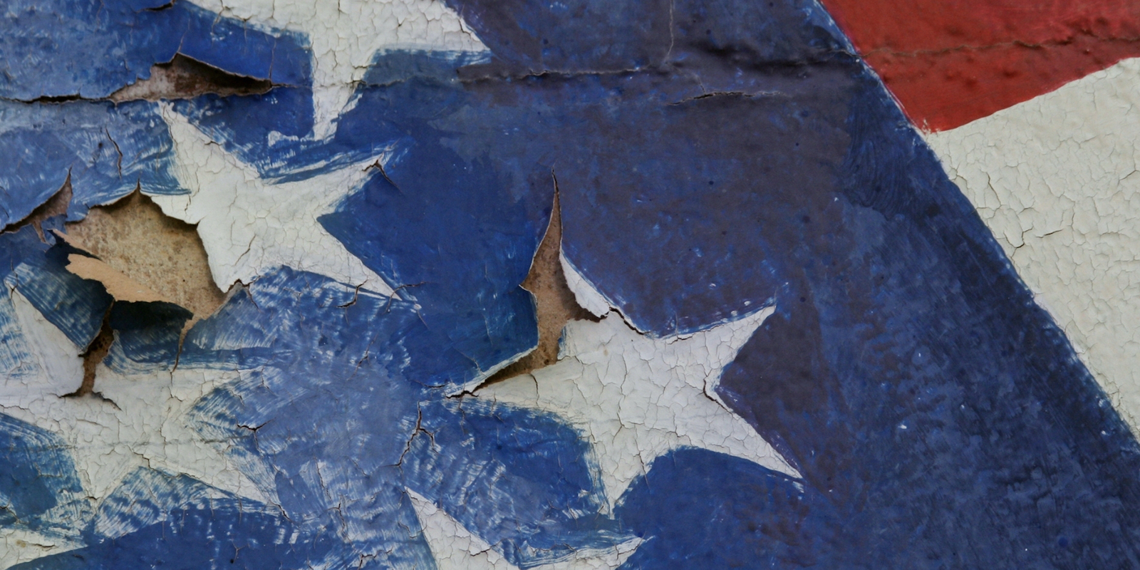 Torn and tattered paper flag