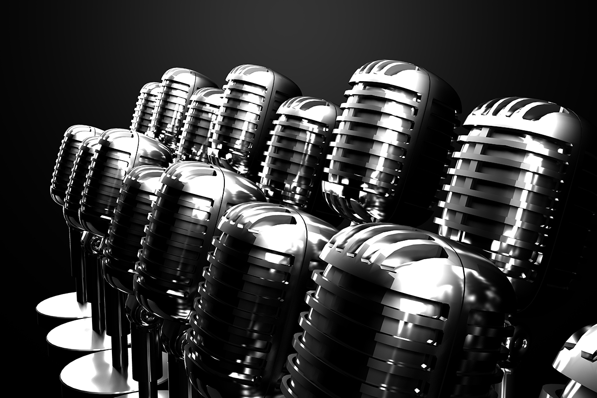 black and white photo of microphones