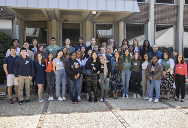 students, faculty, and staff standing in group