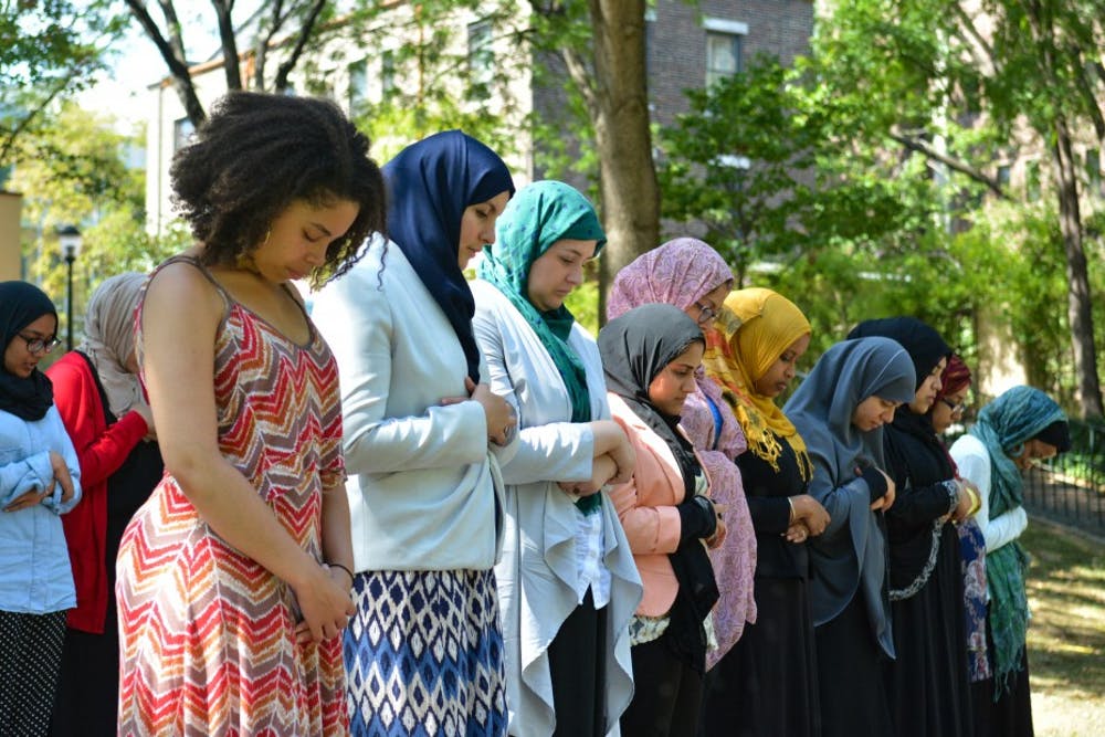 students on campus praying