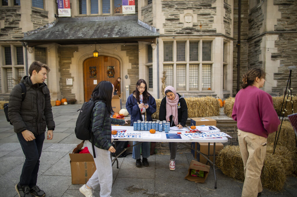 Those voting stop by a table at Penn Commons to check their registration status, and pick up a free La Colombe draft latte.