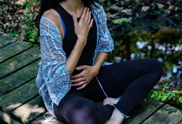 Emily Dunuwila in meditative pose
