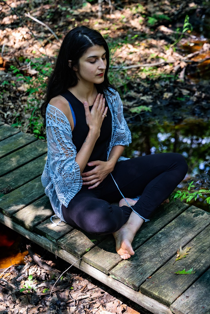 Emily Dunuwila in meditative pose