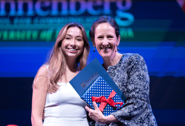 Associate Dean for Undergraduate Studies Litty Paxton presents an award to Celia Kreth (C’23).
