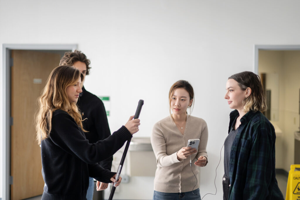 The team of student filmmakers on the conservator team