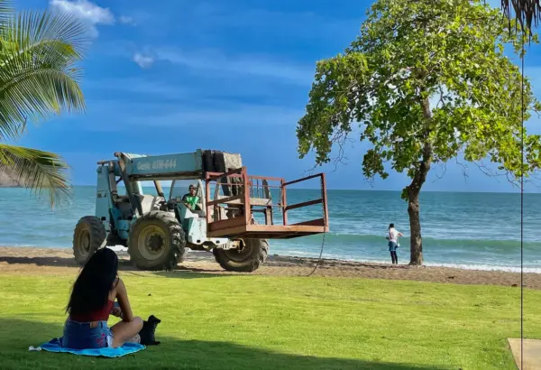 A construction vehicle drives along the beach in Playa Venao, Panama, on May 18, 2023. | Photos by Anusha Mathur for POLITICO