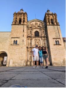 Group travel photo in front of historic building in Mexico