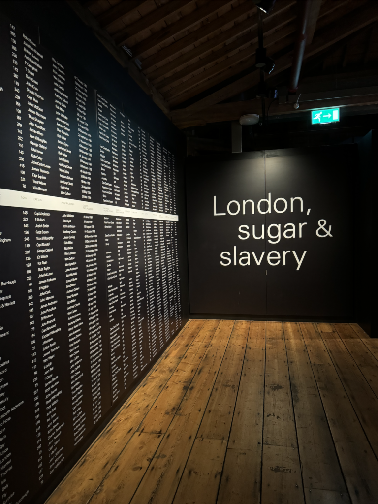 Exhibition signage at history museum that says "London, sugar & slavery