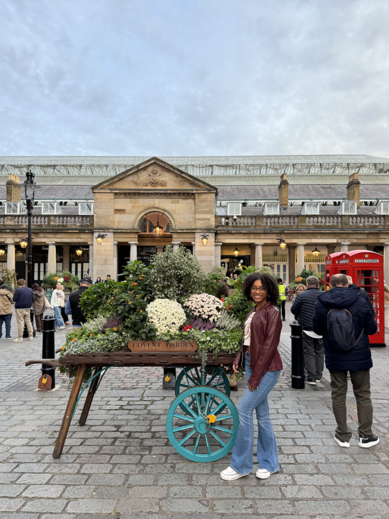 student posing in front of Covent Gardens in London